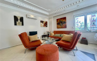 Large apartment of 110 m2 with two bedrooms, near the Tuesday market in Mahmutlar.-id-1562-photo-2