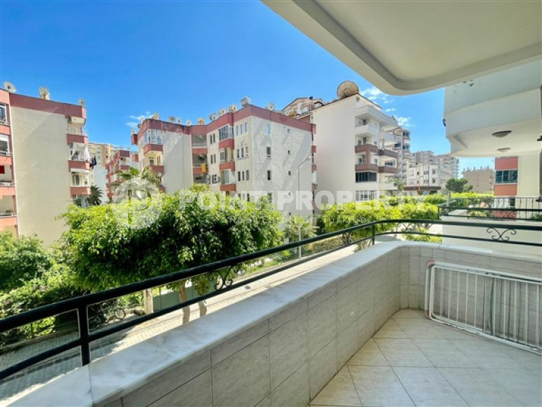 Large apartment of 110 m2 with two bedrooms, near the Tuesday market in Mahmutlar.-id-1562-photo-12