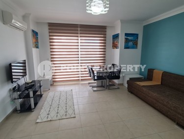 Modern apartment with furniture and household appliances 350 meters from the sea, in the center of Mahmutlar-id-7238-photo-1