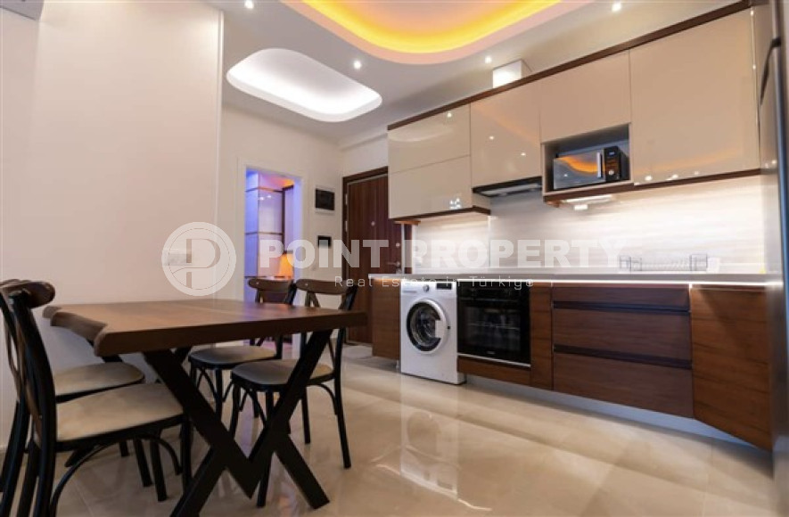 В элитном комплексе: квартира 1+1, 67м², с мебелью, в 300м от пляжей Махмутлара, Алания-id-1563-фото-3