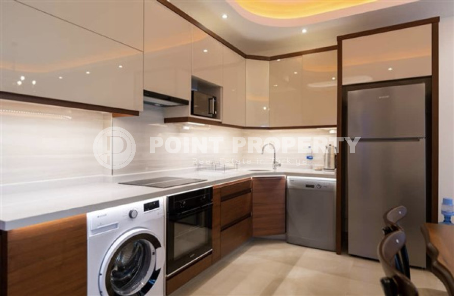 В элитном комплексе: квартира 1+1, 67м², с мебелью, в 300м от пляжей Махмутлара, Алания-id-1563-фото-8