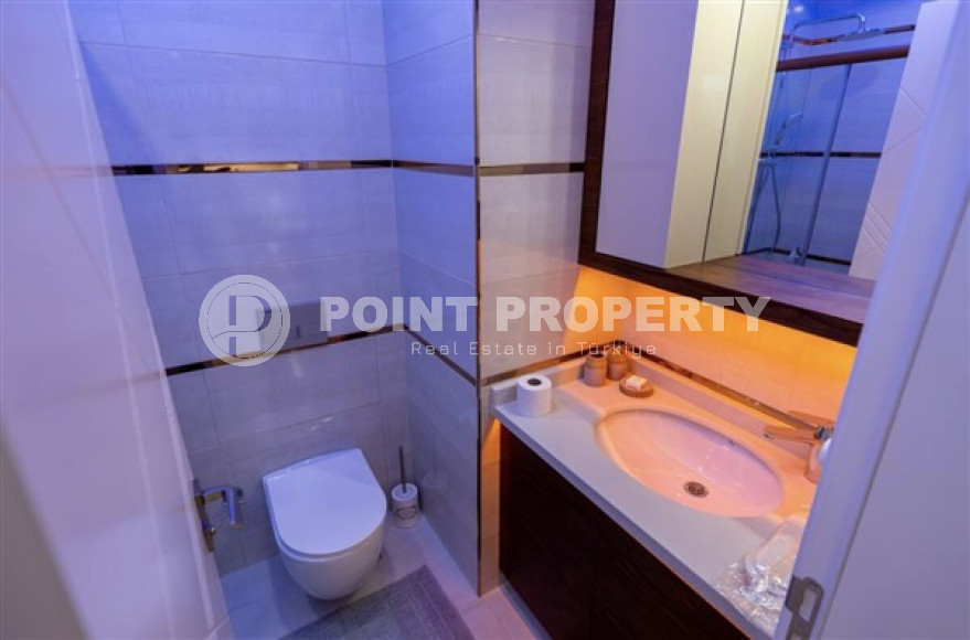 В элитном комплексе: квартира 1+1, 67м², с мебелью, в 300м от пляжей Махмутлара, Алания-id-1563-фото-10