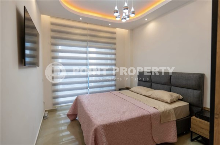 В элитном комплексе: квартира 1+1, 67м², с мебелью, в 300м от пляжей Махмутлара, Алания-id-1563-фото-11