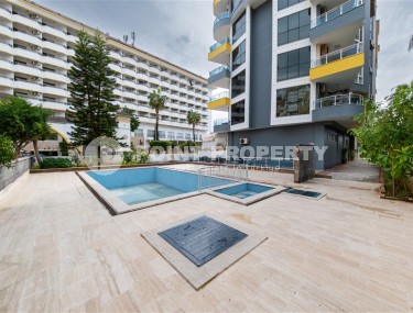 Просторная квартира 2+1 с качественным ремонтом и современным дизайном, в 50 метрах от моря, в центре района Махмутлар-id-7246-фото-2