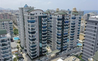 В элитном комплексе: квартира 1+1, 67м², с мебелью, в 300м от пляжей Махмутлара, Алания-id-1563-фото-19