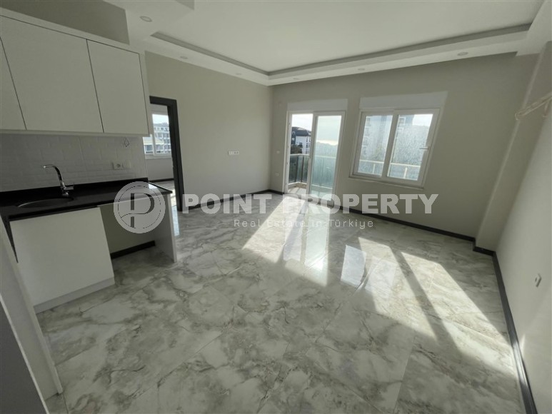 Apartment 1+1 with fine finishing 1100 meters from the sea, in a promising area of Alanya - Avsallar-id-7249-photo-2