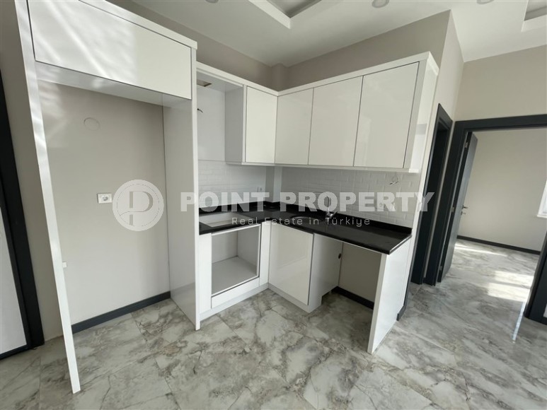 Apartment 1+1 with fine finishing 1100 meters from the sea, in a promising area of Alanya - Avsallar-id-7249-photo-4