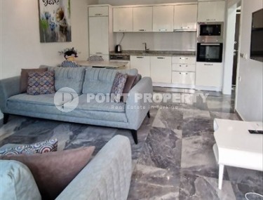 Ready-to-move-in 1+1 apartment with furniture and household appliances, in the center of the modern area of Alanya - Mahmutlar-id-7250-photo-1