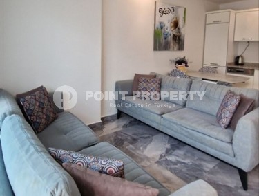 Ready-to-move-in 1+1 apartment with furniture and household appliances, in the center of the modern area of Alanya - Mahmutlar-id-7250-photo-2