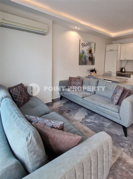Ready-to-move-in 1+1 apartment with furniture and household appliances, in the center of the modern area of Alanya - Mahmutlar-id-7250-photo-2