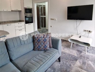 Ready-to-move-in 1+1 apartment with furniture and household appliances, in the center of the modern area of Alanya - Mahmutlar-id-7250-photo-3