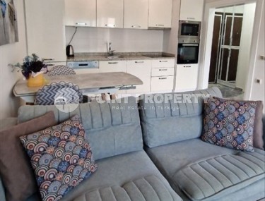 Ready-to-move-in 1+1 apartment with furniture and household appliances, in the center of the modern area of Alanya - Mahmutlar-id-7250-photo-4