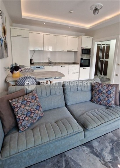 Ready-to-move-in 1+1 apartment with furniture and household appliances, in the center of the modern area of Alanya - Mahmutlar-id-7250-photo-4