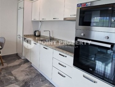 Ready-to-move-in 1+1 apartment with furniture and household appliances, in the center of the modern area of Alanya - Mahmutlar-id-7250-photo-5