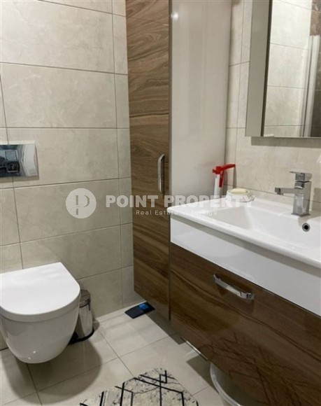 Ready-to-move-in 1+1 apartment with furniture and household appliances, in the center of the modern area of Alanya - Mahmutlar-id-7250-photo-8