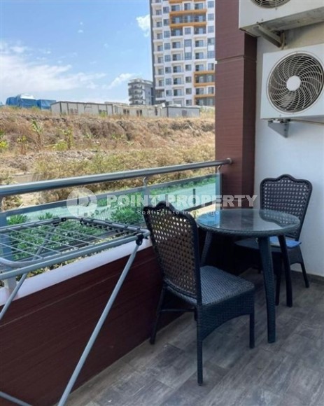 Ready-to-move-in 1+1 apartment with furniture and household appliances, in the center of the modern area of Alanya - Mahmutlar-id-7250-photo-9