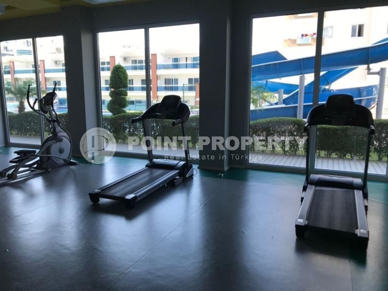 Ready-to-move-in 1+1 apartment with furniture and household appliances, in the center of the modern area of Alanya - Mahmutlar-id-7250-photo-10