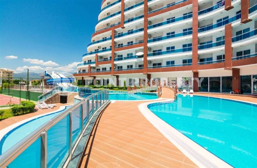 Ready-to-move-in 1+1 apartment with furniture and household appliances, in the center of the modern area of Alanya - Mahmutlar-id-7250-photo-16