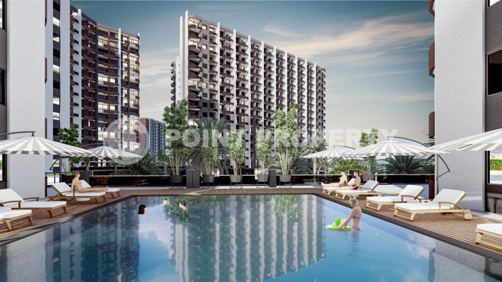 A new investment-attractive project in the resort area of Mersin - Tarsus - a large-scale residential complex consisting of seven 15-storey blocks, ten kilometers from the sea-id-7251-photo-7