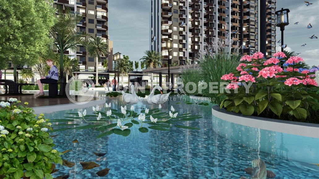 A new investment-attractive project in the resort area of Mersin - Tarsus - a large-scale residential complex consisting of seven 15-storey blocks, ten kilometers from the sea-id-7251-photo-9