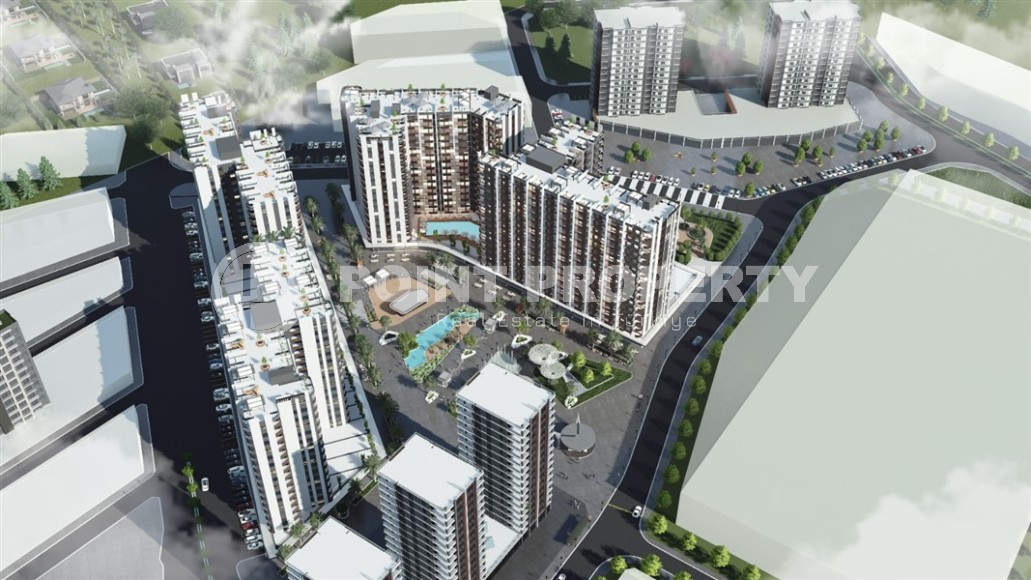 A new investment-attractive project in the resort area of Mersin - Tarsus - a large-scale residential complex consisting of seven 15-storey blocks, ten kilometers from the sea-id-7251-photo-12