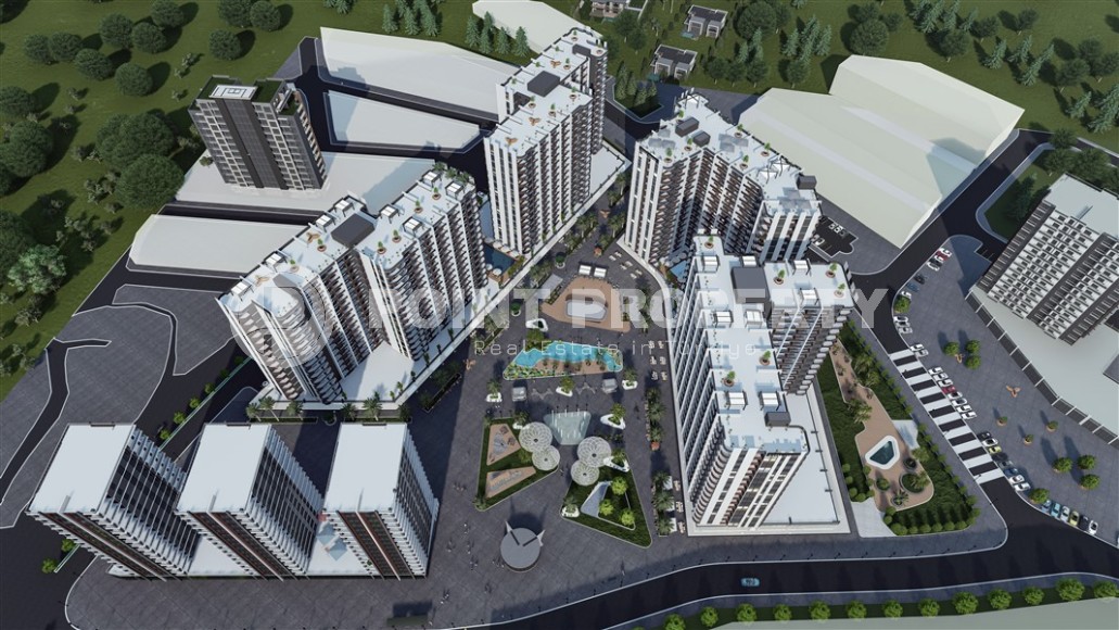 A new investment-attractive project in the resort area of Mersin - Tarsus - a large-scale residential complex consisting of seven 15-storey blocks, ten kilometers from the sea-id-7251-photo-13