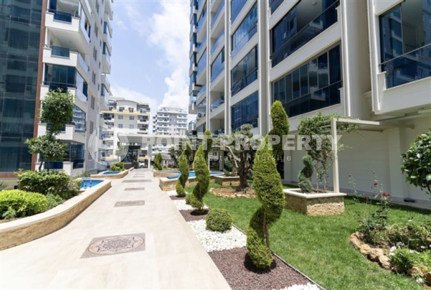 В элитном комплексе: квартира 1+1, 67м², с мебелью, в 300м от пляжей Махмутлара, Алания-id-1563-фото-29