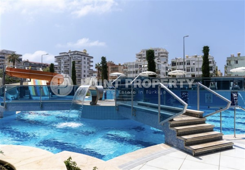 В элитном комплексе: квартира 1+1, 67м², с мебелью, в 300м от пляжей Махмутлара, Алания-id-1563-фото-34