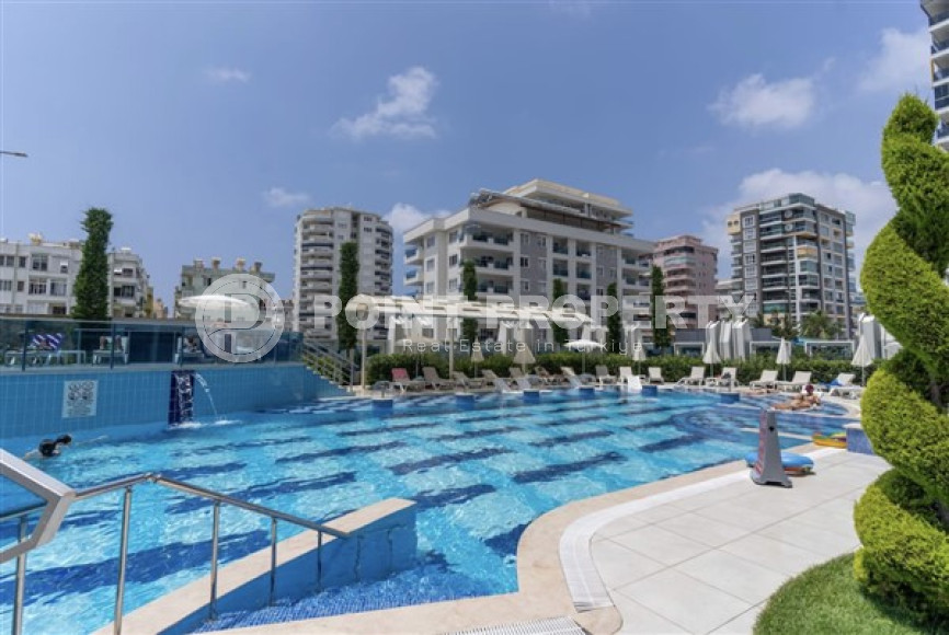 В элитном комплексе: квартира 1+1, 67м², с мебелью, в 300м от пляжей Махмутлара, Алания-id-1563-фото-36