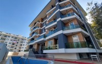New two-room apartments at the stage of completion, Mahmutlar district-id-4337-photo-1