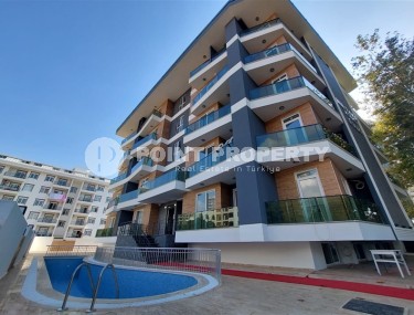 New two-room apartments at the stage of completion, Mahmutlar district-id-4337-photo-1
