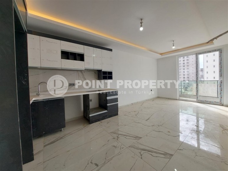 New two-room apartments at the stage of completion, Mahmutlar district-id-4337-photo-2