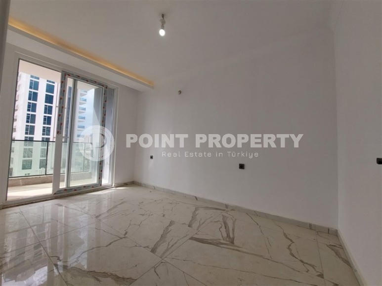 New two-room apartments at the stage of completion, Mahmutlar district-id-4337-photo-3