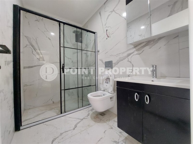 New two-room apartments at the stage of completion, Mahmutlar district-id-4337-photo-5