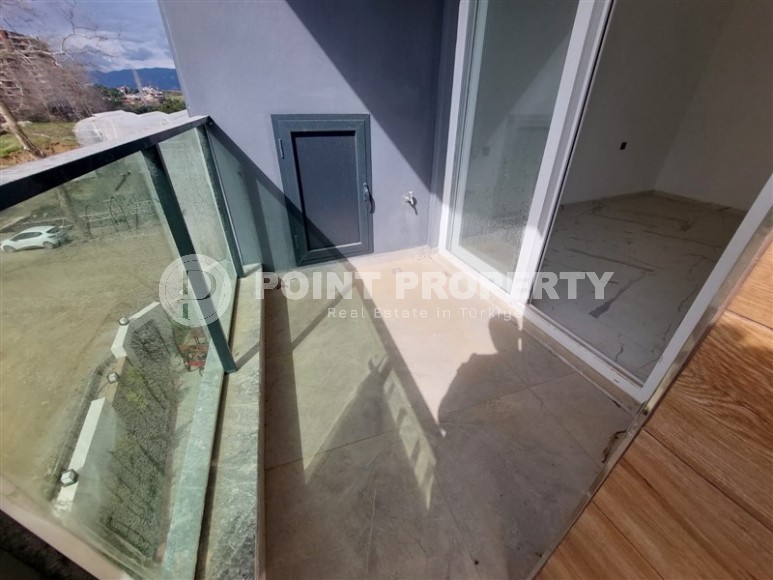 New two-room apartments at the stage of completion, Mahmutlar district-id-4337-photo-7