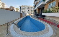 New two-room apartments at the stage of completion, Mahmutlar district-id-4337-photo-10