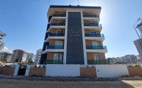 New two-room apartments at the stage of completion, Mahmutlar district-id-4337-photo-13