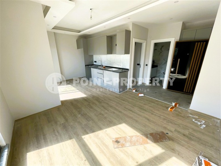 Compact apartment 1+1, on the 1st floor in a residential complex at the final stage of construction, in the Avsallar area-id-6566-photo-3