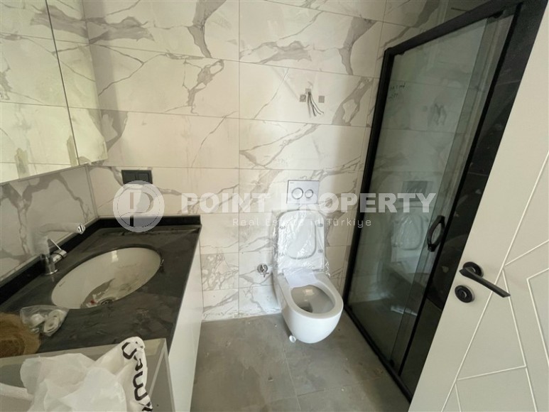 Compact apartment 1+1, on the 1st floor in a residential complex at the final stage of construction, in the Avsallar area-id-6566-photo-7