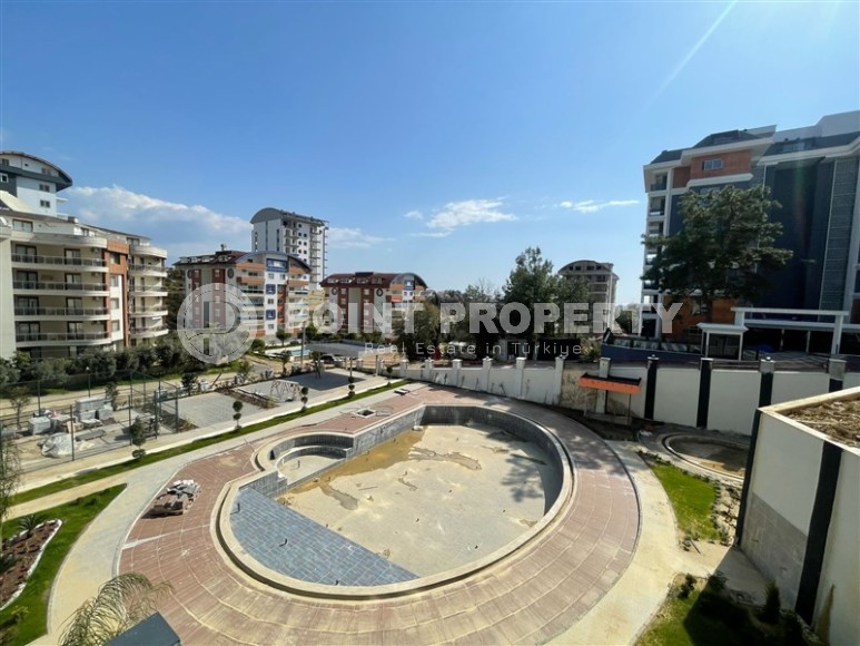 Compact apartment 1+1, on the 1st floor in a residential complex at the final stage of construction, in the Avsallar area-id-6566-photo-9