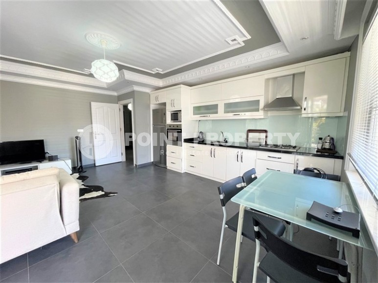 Комфортабельная квартира с мебелью и бытовой техникой в 650 метрах от моря, в центре района Тосмур-id-7265-фото-2