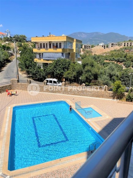 Комфортабельная квартира с мебелью и бытовой техникой в 650 метрах от моря, в центре района Тосмур-id-7265-фото-12