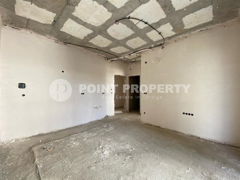 Inexpensive apartment in a residence under construction, in a promising area of Alanya - Avsallar-id-7270-photo-3
