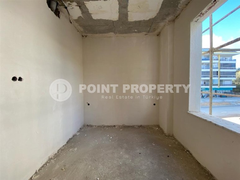 Inexpensive apartment in a residence under construction, in a promising area of Alanya - Avsallar-id-7270-photo-5
