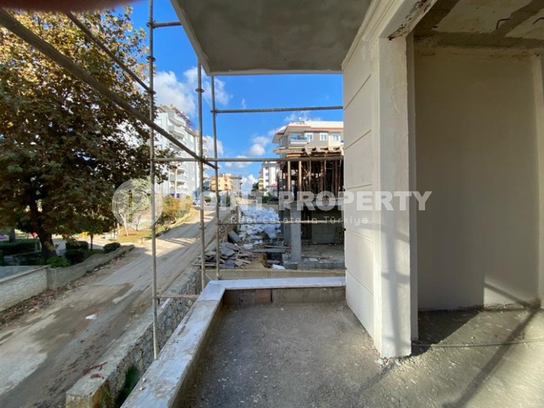 Inexpensive apartment in a residence under construction, in a promising area of Alanya - Avsallar-id-7270-photo-9