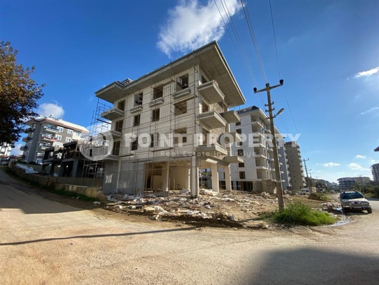 Inexpensive apartment in a residence under construction, in a promising area of Alanya - Avsallar-id-7270-photo-13