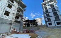 Inexpensive apartment in a residence under construction, in a promising area of Alanya - Avsallar-id-7270-photo-14