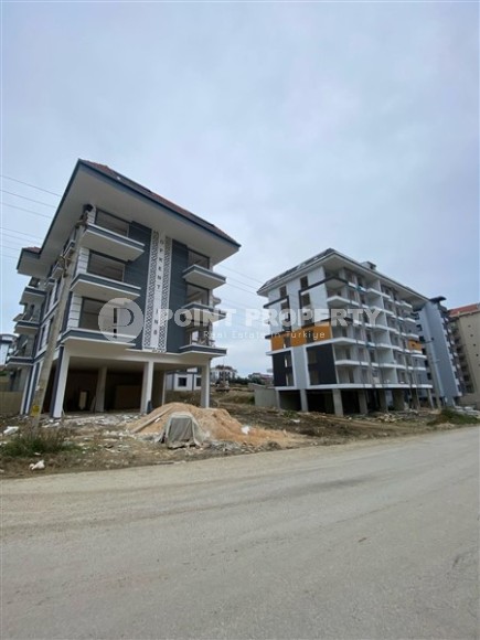 Inexpensive apartment in a residence under construction, in a promising area of Alanya - Avsallar-id-7270-photo-15