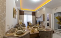 Small apartment with modern design, comfortable furniture and the latest appliances, in a popular area of Alanya - Mahmutlar-id-7273-photo-2