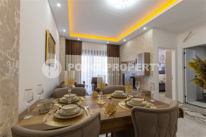 Small apartment with modern design, comfortable furniture and the latest appliances, in a popular area of Alanya - Mahmutlar-id-7273-photo-2